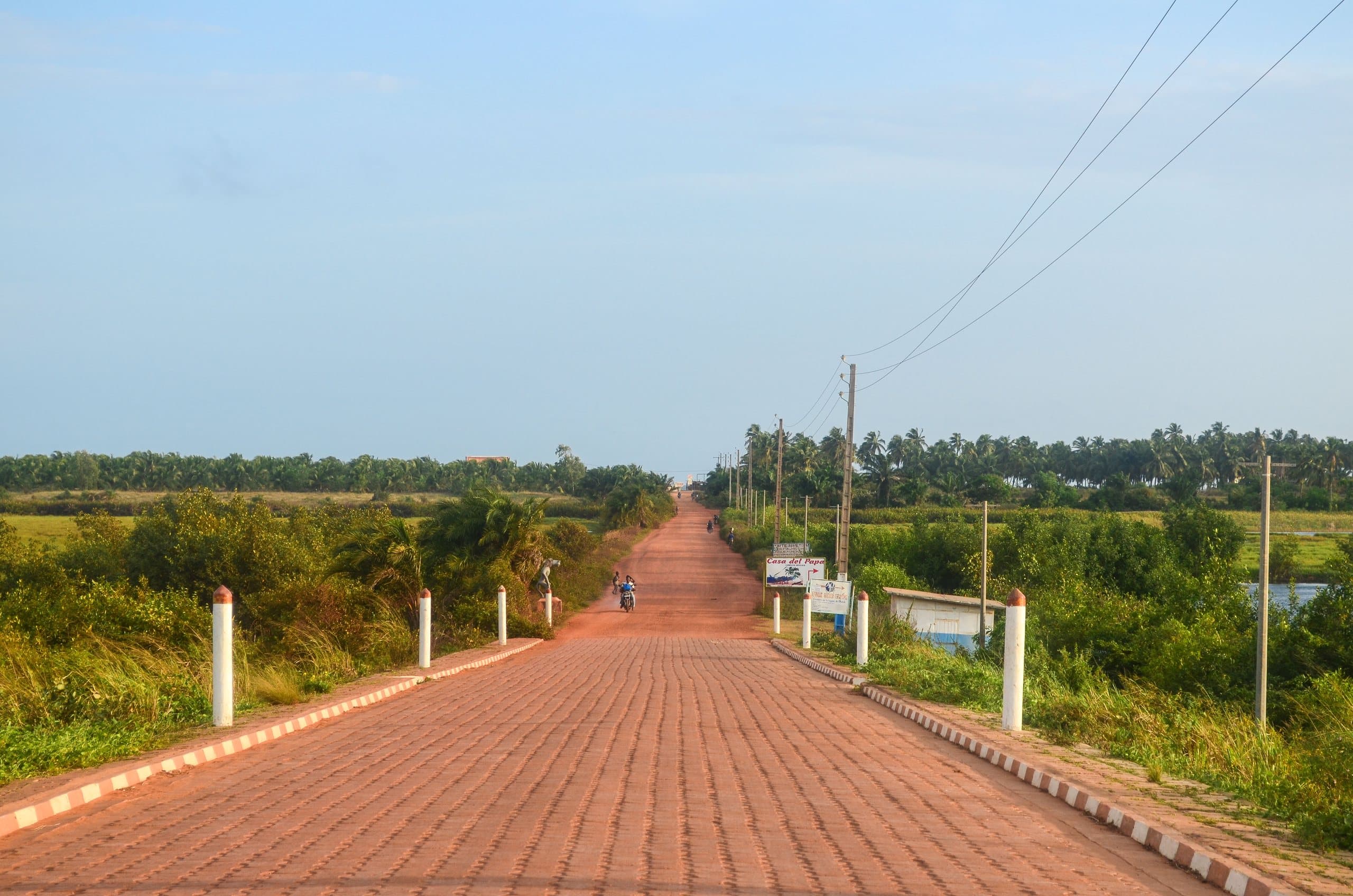 The Slave Route, a red-brick road running towards the beach